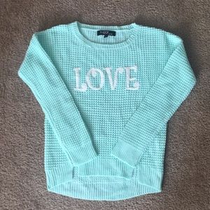 Knit long sleeve mint green sweater.